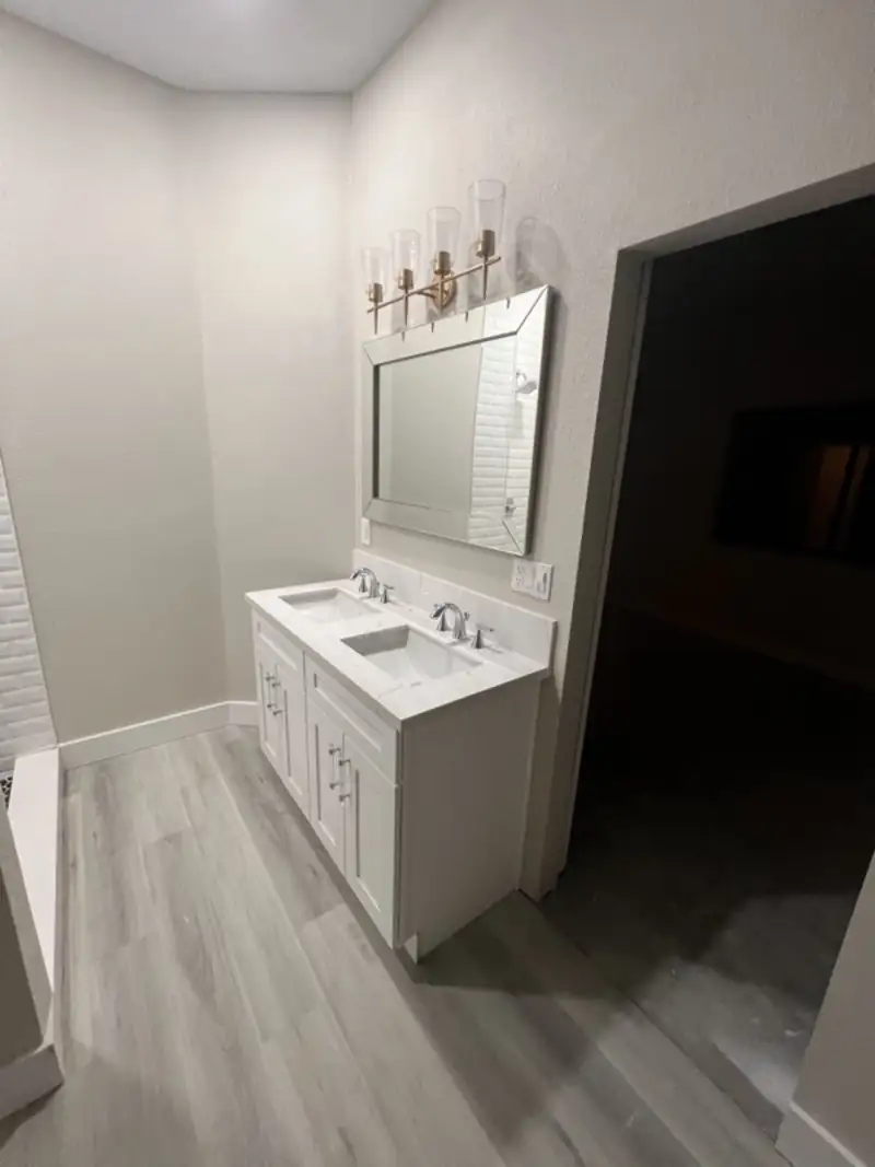 Bathroom double vanity with sconce lighting